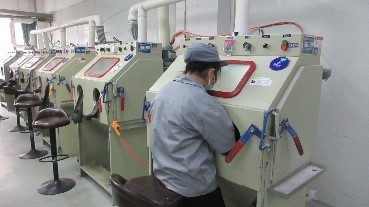 Sand-blasting surface treatment